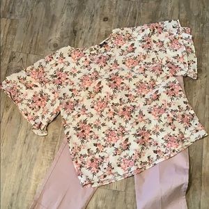 Soft, flowing shirt with ruffles on the sleeves.